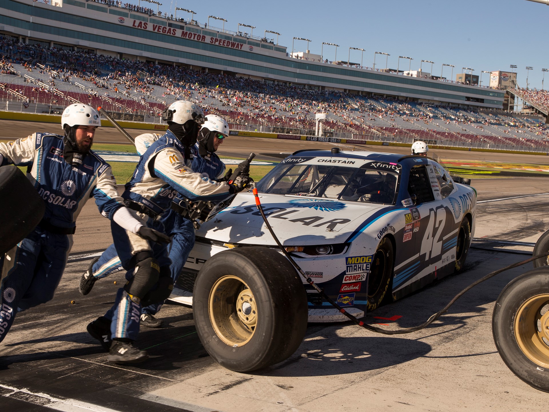 The pit crew for Ross Chastain #42, help him maintain his lead