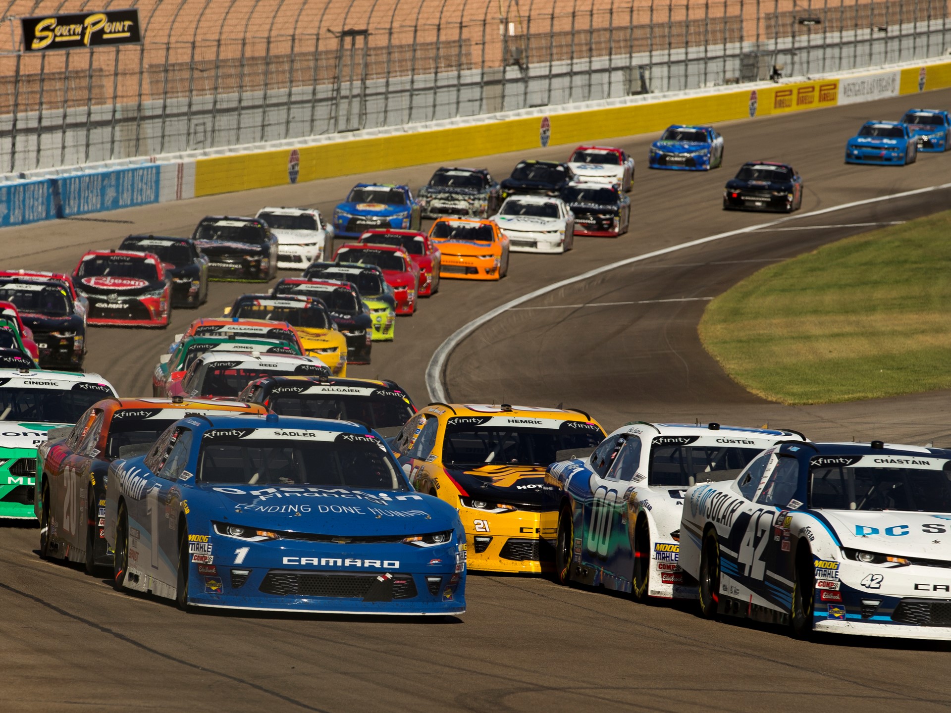 Ross Chastain #42, front right, leads the pack for most of the 200 laps during the NASCAR Xfinity Series DC Solar 300