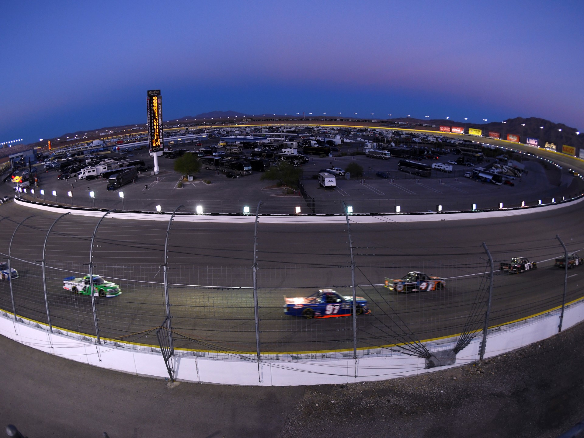 The field makes its way through turn one during the NASCAR Camping World Truck Series World of Westgate 200