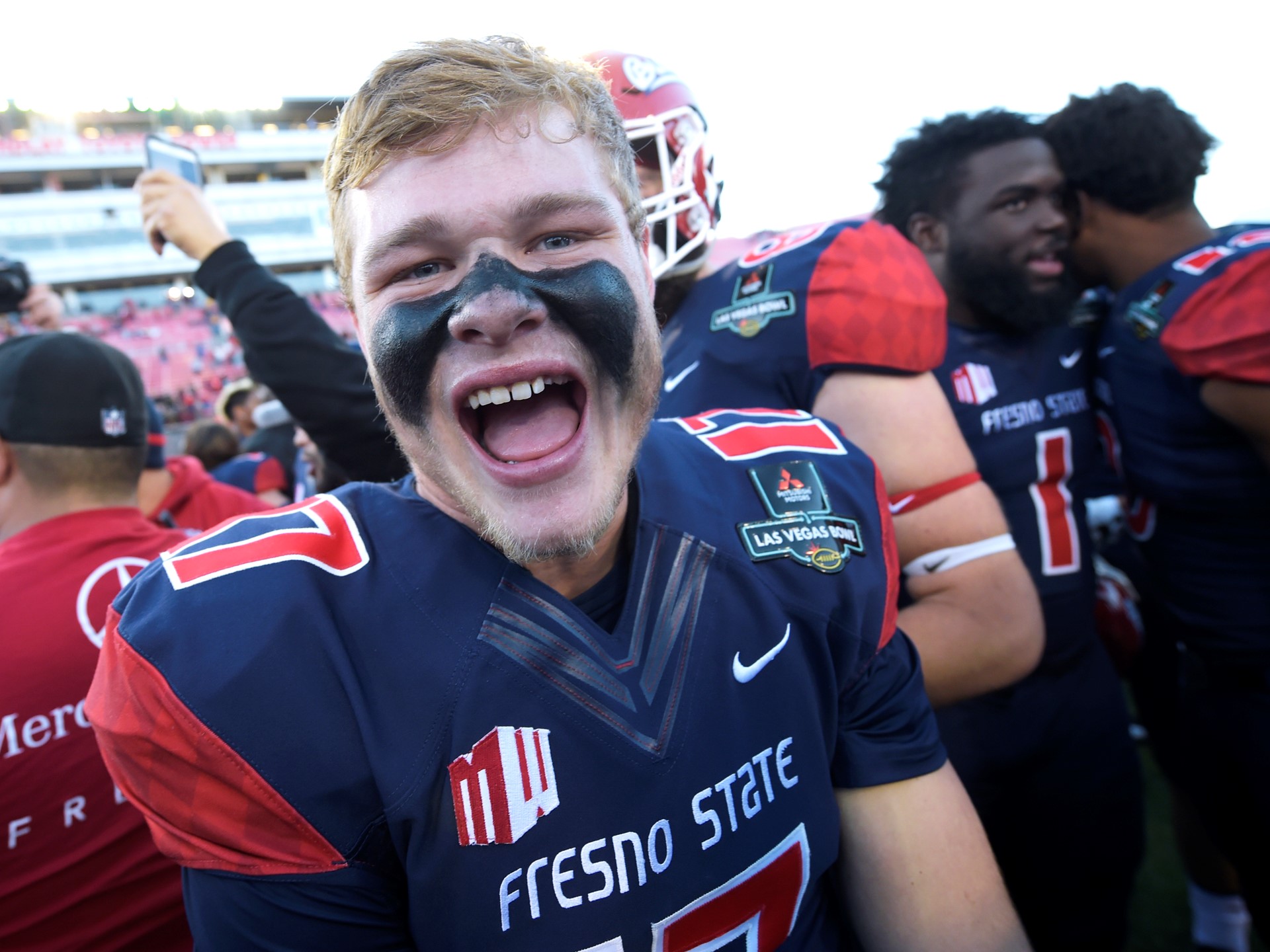 Fresno State quarterback Steven Comstock celebrates