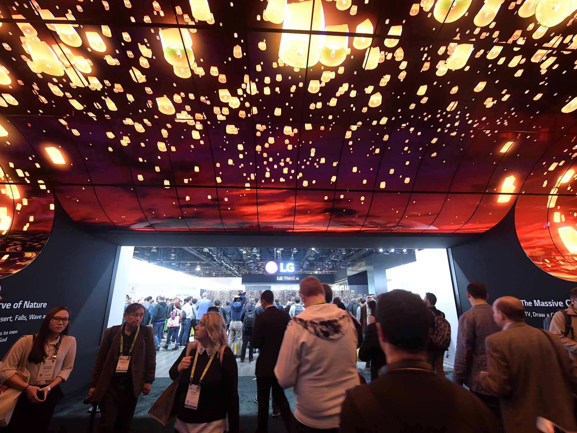 Attendees walk through the entry