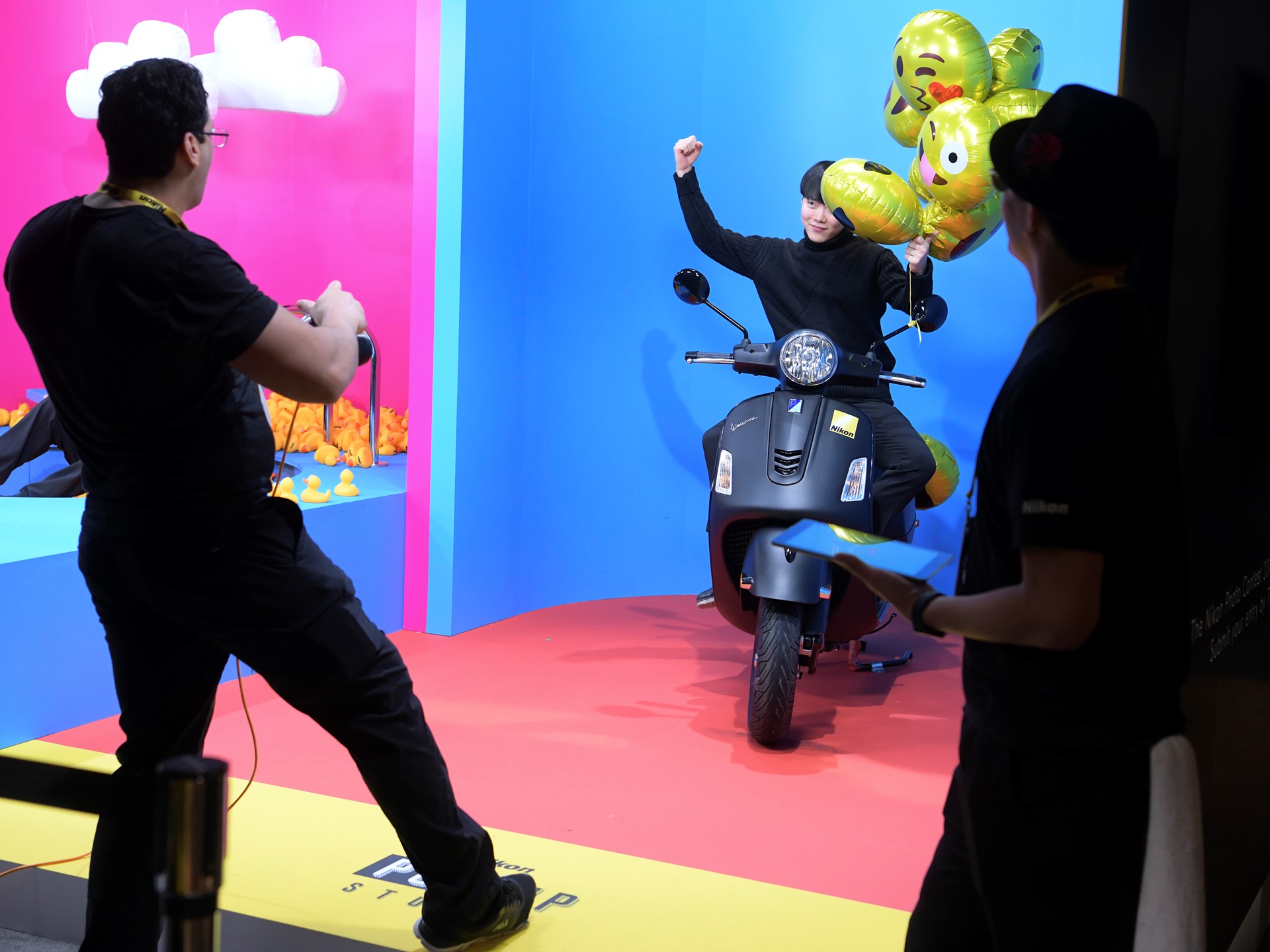 An attendee has his photo taken