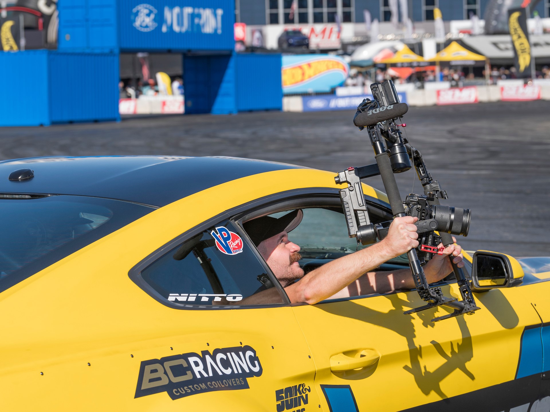 A cameraman grabs footage