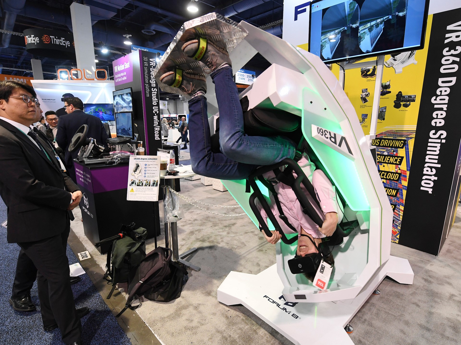 Earl Schaffer tries out a 360 degree VR simulator