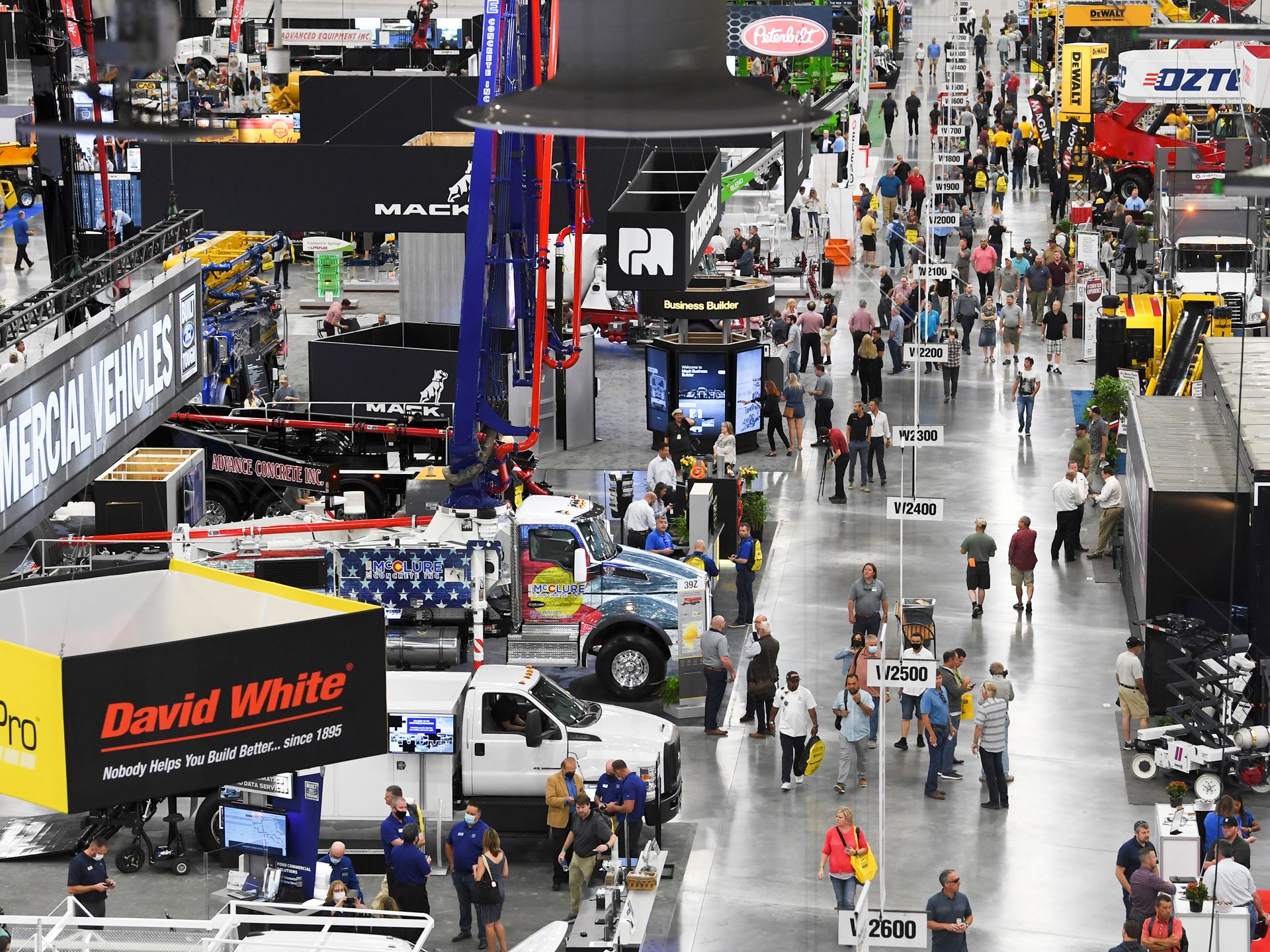 Attendees walk the Las Vegas Convention Center West Hall exhibit hall during the first day of the World of Concrete expo