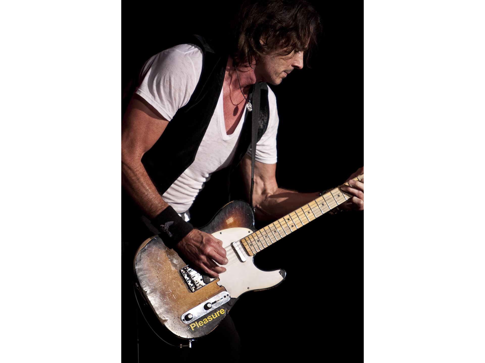5. Rick Springfield Playing Guitar During Concert