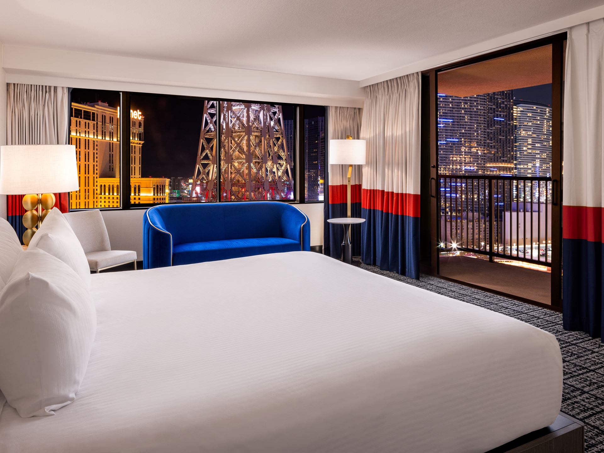 Paris Las Vegas Versailles Tower Balcony Room King Bed Eiffel Tower View credit Caesars Entertainment