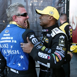 Funny Car winner Tommy Johnson Jr. and Top Fuel winner Antron Brown