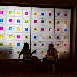 Attendees chat in a hallway at the Meeting Professionals International (MPI) World Education Congress 2017