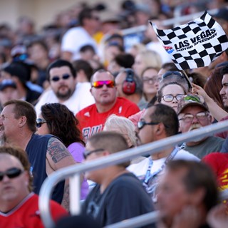 A flag waves in the grandstands during the NASCAR Camping World Truck Series