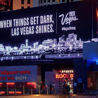 Marquees along the Las Vegas Strip display a message of resilience