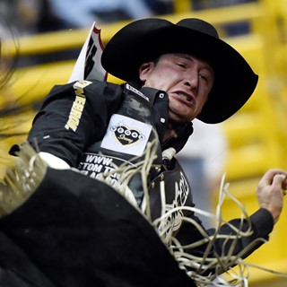 Jake Vold from Ponoka, Alberta, Canada, competes in bareback riding in the seventh go-round of the National Finals Rodeo