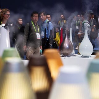 Attendees check out a line of diffusers during the second day of CES