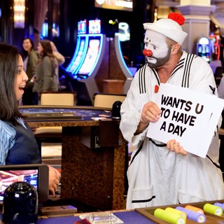 Blackjack dealer is surprised with time off by clown from "O" by Cirque du Soleil