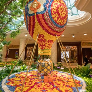 A balloon crafted of flowers decorates the Wynn atrium