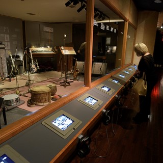 Guests get a look at recording studio artifacts at the Rolling Stones "Exhibitionism"