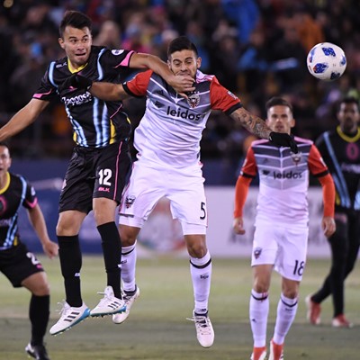 Las Vegas Lights Carlos Alvarez collides with D.C. United's Junior Moreno