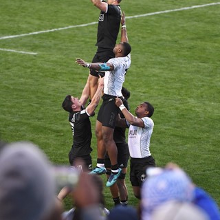 New Zealand and Fiji compete for a line out during their match at the USA Sevens Rugby tournament