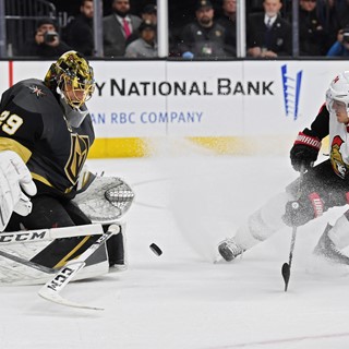 Even after dropping his stick, Vegas Golden Knights goaltender Marc-Andre Fleury (29) stops a point blank shot