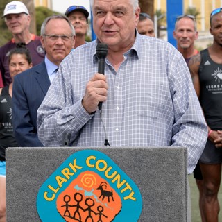 Clark County Commissioner Steve Sisolak thanks the Vegas Strong Resiliency Center’s Boston Marathon Team