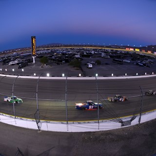 The field makes its way through turn one during the NASCAR Camping World Truck Series World of Westgate 200