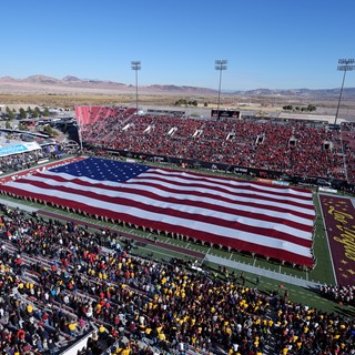 A U.S. flag covers the field