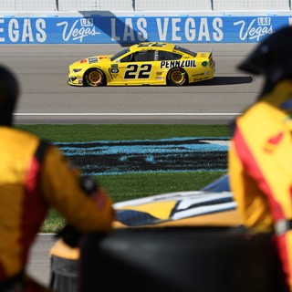 Joey Logano makes his way out of turn four