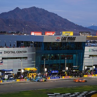 Cars move through pit road