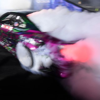 A car billows smoke