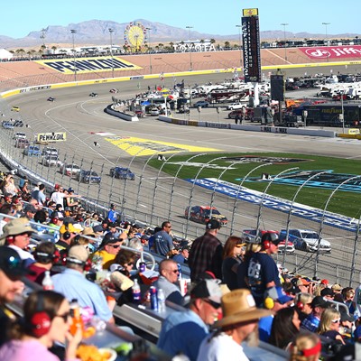 Attendees watch the NASCAR Cup Series Pennzoil 400