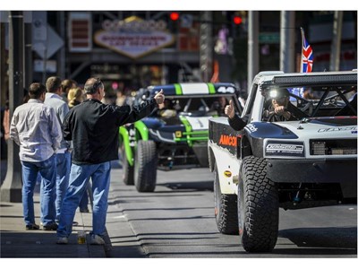 Race fans greet the drivers in the Mint 400 4 Wheel Parts Vehicle Procession
