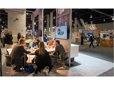 Salespeople meet in the NEP broadcast technology booth