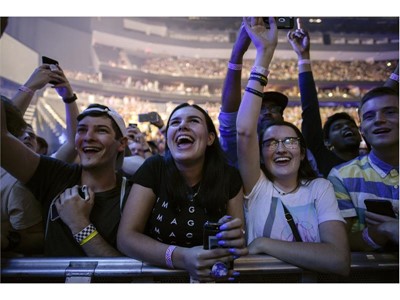 Fans cheer as Imagine Dragons performs