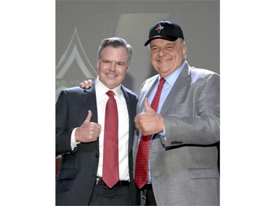 Jim Murren (l) Chairman and CEO of MGM Resorts International and Clark County Commissioner Steve Sisolak, wearing the ne