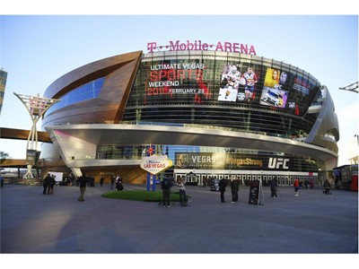A banner ad on the side of T-Mobile Arena announces the Ultimate Vegas Sports Weekend pep rally