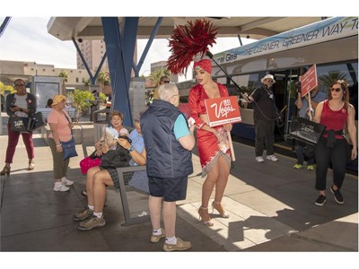 Las Vegas showgirl Porsha Revesz greets riders at the Bonneville RTC Transit Stations