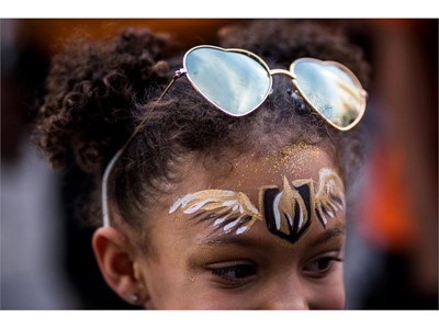 Tenlee Jenkins, 6, has her face painted before the start of Game 6