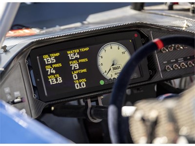 The digital dashboard of a car is lit up during tuning in preparation for the 2018 NASCAR Burnout Blvd