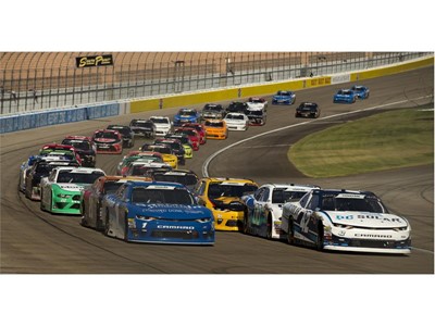 Ross Chastain #42, front right, leads the pack for most of the 200 laps during the NASCAR Xfinity Series DC Solar 300