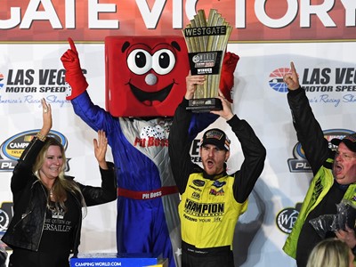 Grant Enfinger (98) celebrates his victory in the NASCAR Camping World Truck Series World of Westgate 200