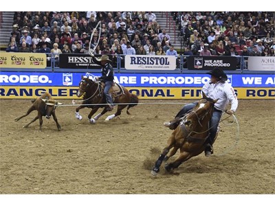 Erich Rogers and Clint Summers compete in team roping