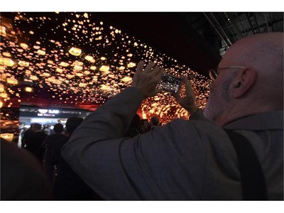 Attendees take photos