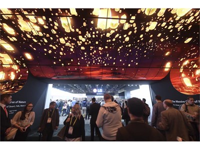 Attendees walk through the entry