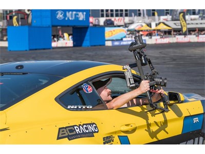 A cameraman grabs footage