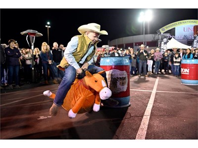 Fan Zone: Dalton Olson of Colorado participates in barrel race
