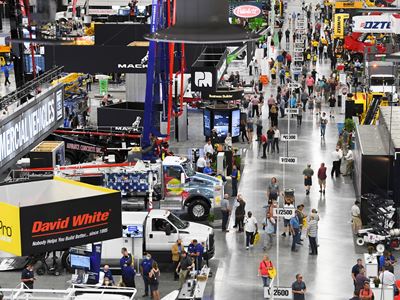 Attendees walk the Las Vegas Convention Center West Hall exhibit hall during the first day of the World of Concrete expo