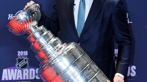 Alex Ovechkin poses with the Stanley Cup
