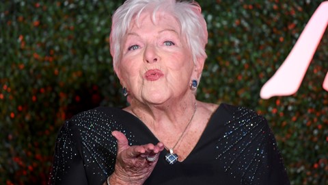Singer and actress Line Renaud blows a kiss