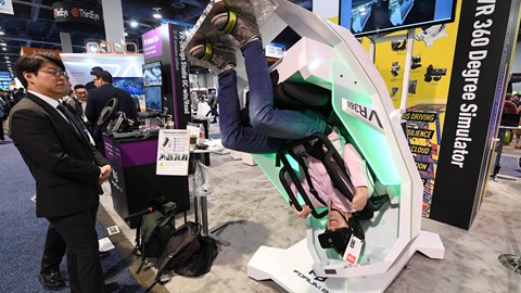 Earl Schaffer tries out a 360 degree VR simulator