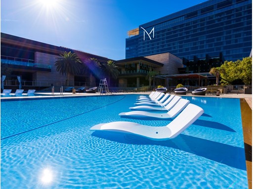 Partially submerged lounge chairs are perfect for cooling off in the sun at the M Resort Partially submerged lounge chairs are perfect for cooling off in the sun at the M Resort